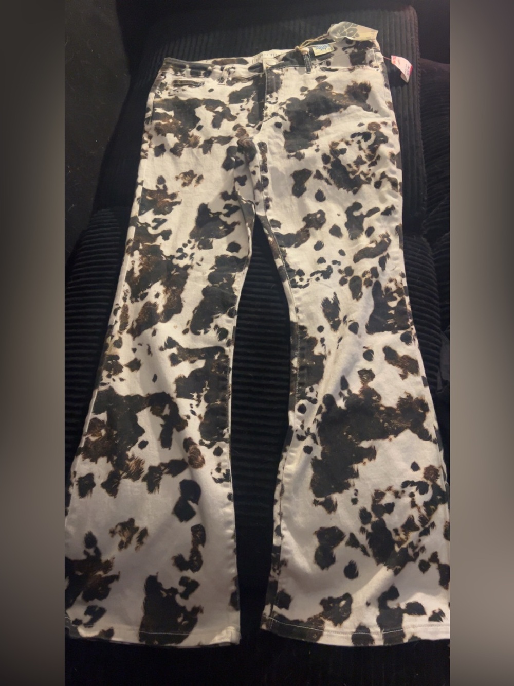 Women’s Cow-Print Flare Jeans in White and Black